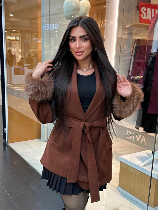 Short wool coat with fur around the sleeves