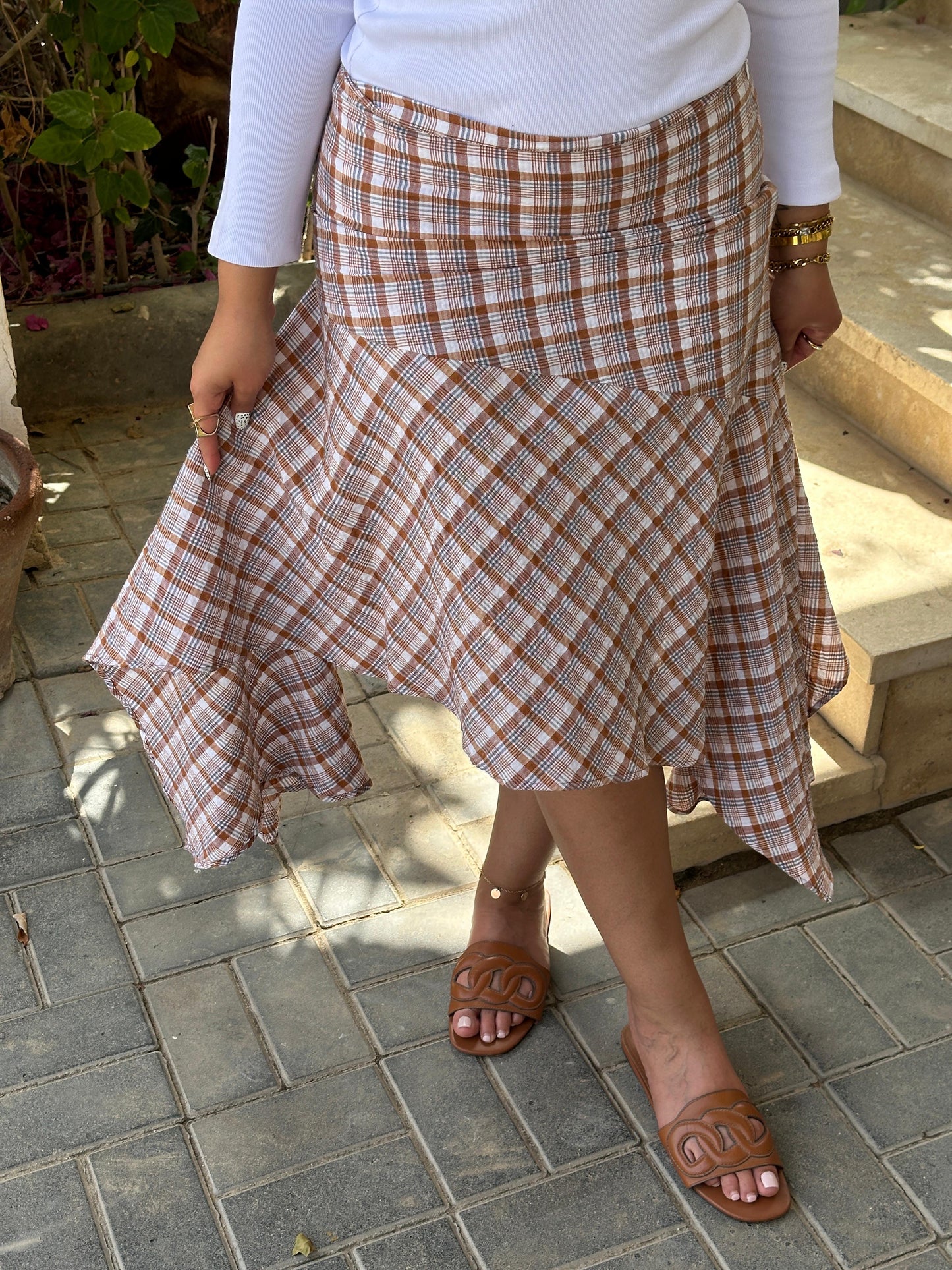 Asymmetric carreaux midi skirt