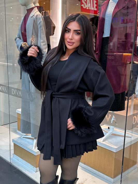Short wool coat with fur around the sleeves